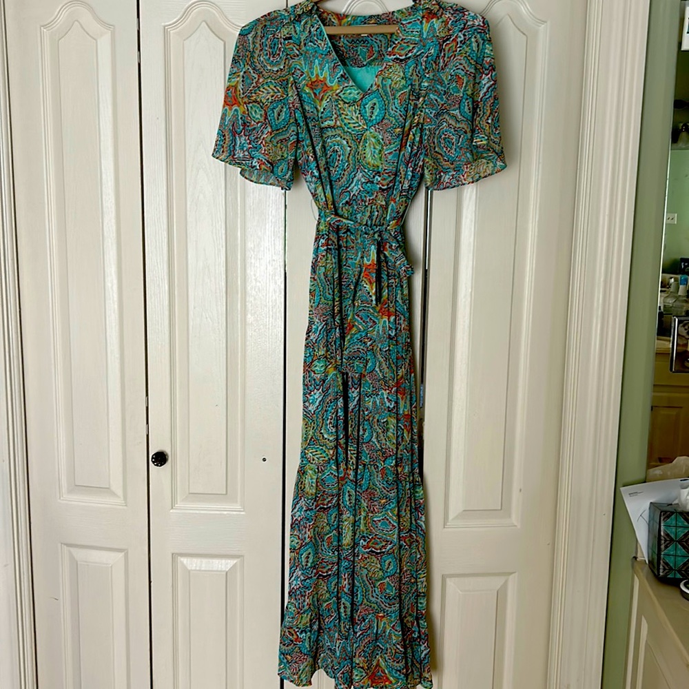 Light teal green dress with brilliant floral colors.